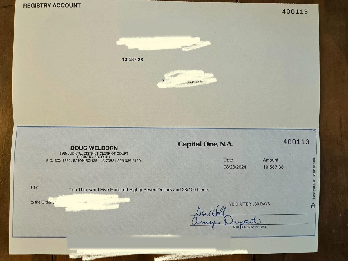 Redacted check from the 19th Judicial District Clerk of Court Registry Account for $10,587.38, dated 08/23/2024